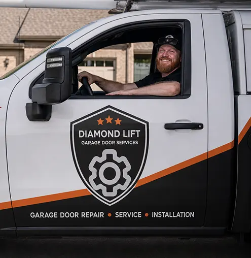 DiamondLift Garage Doors technician in a branded service truck